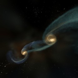 Colliding galaxies can force the supermassive black holes in their cores together (NCSA)