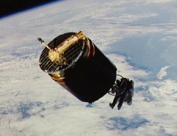 View of the Westar 6 satellite while Dale Gardner retrieves it during STS-51-A in 1984 (NASA)