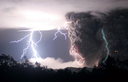 Bolts of lightning erupt as the plume rises (Daily Mail/UPI/Carlos Gutierrez)