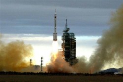 Long March II F rocket carrying Chinas second manned spacecraft Shenzhou VI in 2005 (Xinhua)