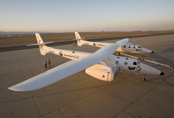 Sir Richard Branson and designer Burt Rutan walk aside the Virgin Mothership \"Eve\" (VMS EVE) in Mojave, CA. on the eve of its official rollout on July 28, 2008 (Virgin Galactic)