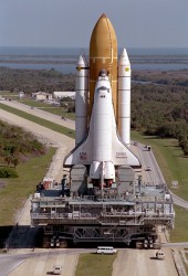 Space Shuttle Discovery inching its way along the Crawlerway to pad 39B (NASA)