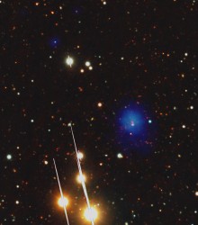 The bright blue blog is an ancient galaxy cluster. Credits: ESA XMM-Newton/EPIC, LBT/LBC, AIP (J. Kohnert) The bright blue blob is an ancient galaxy cluster. Credits: ESA XMM-Newton/EPIC, LBT/LBC, AIP (J. Kohnert)