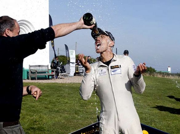 The Swiss pilot Yves Rossy is sprayed with champagne near Dover after flying with jet-propelled wings across the Channel from France (Adrian Dennis/AFP/Getty) The Swiss pilot Yves Rossy is sprayed with champagne near Dover after flying with jet-propelled wings across the Channel from France (Adrian Dennis/AFP/Getty)