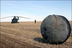 Foton M3 after landing in Kazakhstan after the experiment. Samples, including Orkney sample, are screwed onto