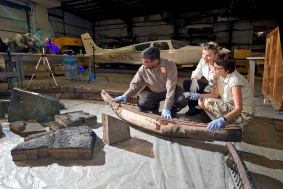 Scientists examine the 1966 Apollo test vehicle heat shield (Smithsonian Museum/Eric Long)