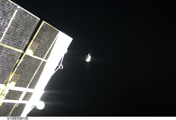 Lost tool bag floats away from the ISS.  Credit: NASA