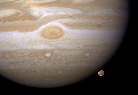 Ganymede is about to hide behind Jupiter. Credit: NASA, ESA, and E. Karkoschka (University of Arizona)