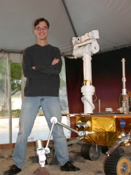 Rover Driver Scott Maxwell with a model of MER. Photo courtesy Scott Maxwell