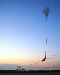 ARCADE launches on its July 2006 discovery flight from NASA's Columbia Scientific Balloon Facility in Palestine, Texas. The balloon lofted the instrument to its observation altitude of 120,000 feet. Credit: NASA/ARCADE ARCADE launches on its July 2006 discovery flight from NASA's Columbia Scientific Balloon Facility in Palestine, Texas. The balloon lofted the instrument to its observation altitude of 120,000 feet. Credit: NASA/ARCADE
