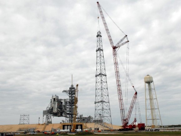 On Launch Pad 39B at NASA's Kennedy Space Center, a crane completes construction of one of the towers in the new lightning protection system for the Constellation Program. Credit: NASA On Launch Pad 39B at NASA's Kennedy Space Center, a crane completes construction of one of the towers in the new lightning protection system for the Constellation Program. Credit: NASA