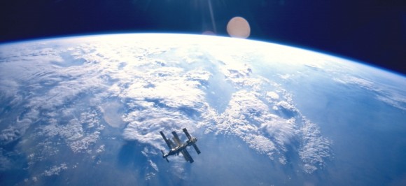 The Mir space station hangs above the Earth in 1995 (photo by Atlantis STS-71, NASA)