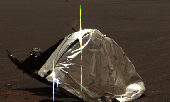 A fanciful image of Opportunity's reflection in its heat sheild -- an image that was never taken, but created by Stuart Atkinson. Credit: NASA/JPL/Stuart Atkinson A fanciful image of Opportunity's reflection in its heat sheild -- an image that was never taken, but created by Stuart Atkinson. Credit: NASA/JPL/Stuart Atkinson