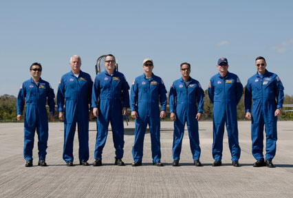 The crew members for the STS-119 mission pose for a photo after arriving at NASA's Kennedy Space Center in Florida to prepare for launch. Photo credit: NASA/Kim Shiflett The crew members for the STS-119 mission pose for a photo after arriving at NASA's Kennedy Space Center in Florida to prepare for launch. Photo credit: NASA/Kim Shiflett