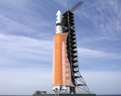 The Ares V at the launchpad, including the possible configuration of the anti-bat mesh (NASA)