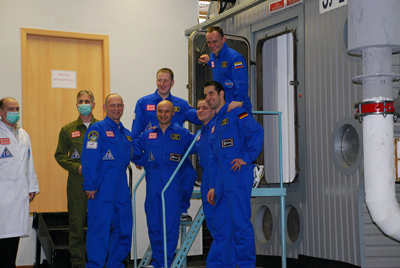 dsc_7074_l The Mars 500 simulation participants enter their new home. Image Credit: ESA