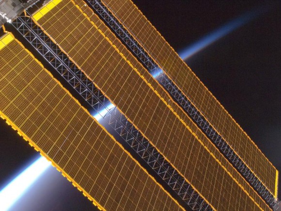 Our Earth's horizon and the International Space Station's solar array panels are featured in this image photographed by the Expedition 17 crew in August 2008. Credit: NASA Our Earth's horizon and the International Space Station's solar array panels are featured in this image photographed by the Expedition 17 crew in August 2008. Credit: NASA