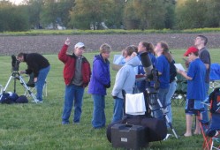 Teaching hands-on astronomy.  Credit: N. Atkinson