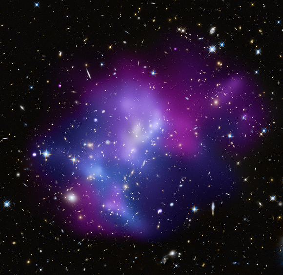 Composite image of MACSJ0717. Credit: X-ray (NASA/CXC/IfA/C. Ma et al.); Optical (NASA/STScI/IfA/C. Ma et al.)