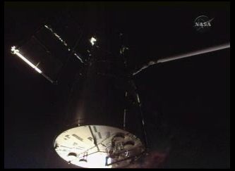 Hubble grappled by Atlantis' RMS. Credit: NASA TV Hubble grappled by Atlantis' RMS. Credit: NASA TV