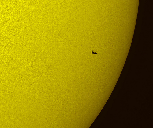 In this tightly cropped image, the NASA space shuttle Atlantis is seen in silhouette during solar transit, Tuesday, May 12, 2009, from Florida. This image was made before Atlantis and the crew of STS-125 had grappled the Hubble Space Telescope. Photo Credit: (NASA/Thierry Legault) In this tightly cropped image, the NASA space shuttle Atlantis is seen in silhouette during solar transit, Tuesday, May 12, 2009, from Florida. This image was made before Atlantis and the crew of STS-125 had grappled the Hubble Space Telescope. Photo Credit: (NASA/Thierry Legault)