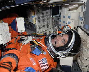 Astronaut Chris Cassidy getting strapped into the shuttle. Credit: NASA Astronaut Chris Cassidy getting strapped into the shuttle. Credit: NASA