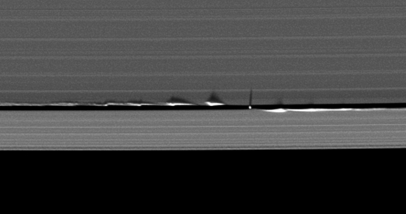 Vertical structures created by Saturn's small moon Daphnis cast long shadows across the rings in this dramatic image taken as the planet approaches its mid-August 2009 equinox. Credit: CICLOPS Vertical structures created by Saturn's small moon Daphnis cast long shadows across the rings in this dramatic image taken as the planet approaches its mid-August 2009 equinox. Credit: CICLOPS
