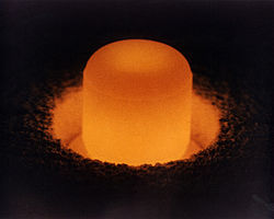Pellet of Pu-238. RTGs) are constructed using marshmallow-sized pellets of Pu-238. As it decays, interactions between the alpha particles and the shielding material produce heat that can be converted into electricity. Pellet of Pu-238. RTGs are constructed using marshmallow-sized pellets of Pu-238. As it decays, interactions between the alpha particles and the shielding material produce heat that can be converted into electricity.