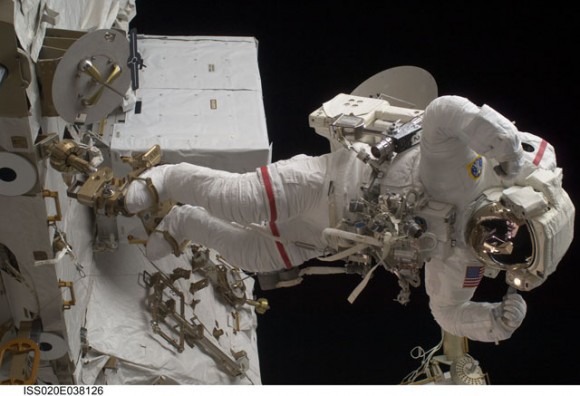 Olivas flexes his muscles. Credit: NASA Olivas flexes his muscles. Credit: NASA