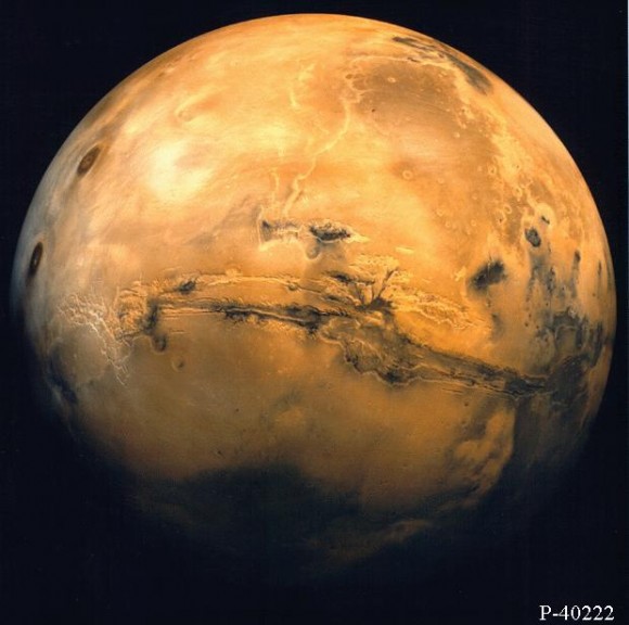 Mars from orbit. Valles Marineris and Volcanic region