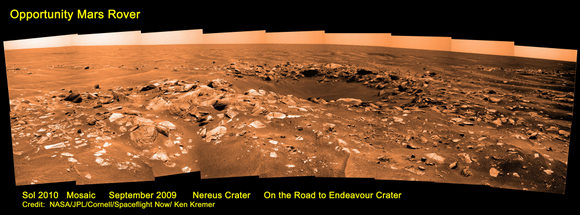 Opportunity mosaic from Sol 2010 showing Nereus Crater and dunes on the Road to Endeavour Crater. Credit: NASA/JPL/Cornell/Spaceflight Now/Ken Kremer. Used by permission. Click image for larger version. Opportunity mosaic from Sol 2010 showing Nereus Crater and dunes on the Road to Endeavour Crater. Credit: NASA/JPL/Cornell/Spaceflight Now/Ken Kremer. Used by permission. Click image for larger version.