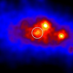 Brighter colors indicate greater numbers of gamma rays detected in this Fermi LAT view of a region centered on the position of Cygnus X-3 (circled). The brightest sources are pulsars. Credit: NASA/DOE/Fermi LAT Collaboration Brighter colors indicate greater numbers of gamma rays detected in this Fermi LAT view of a region centered on the position of Cygnus X-3 (circled). The brightest sources are pulsars. Credit: NASA/DOE/Fermi LAT Collaboration