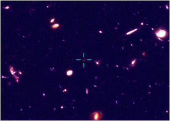 A portion of the Hubble Ultra Deep Field showing the location of a potentially very distant galaxy (marked by crosshairs). Credit: Oxford University A portion of the Hubble Ultra Deep Field showing the location of a potentially very distant galaxy (marked by crosshairs). Credit: Oxford University