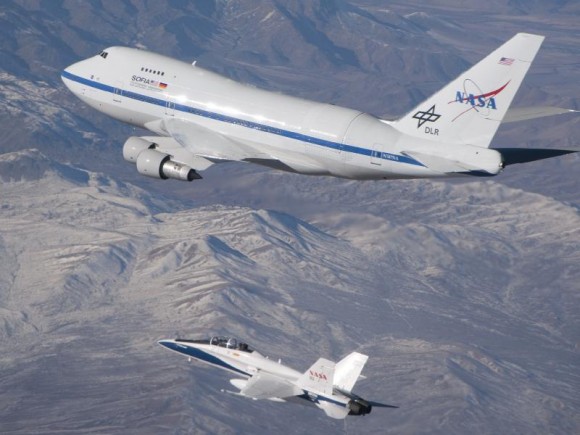 SOFIA, accompanied by an F/A-18 during the open-door testing in December of 2009. Image Credit: NASA/Jim Ross