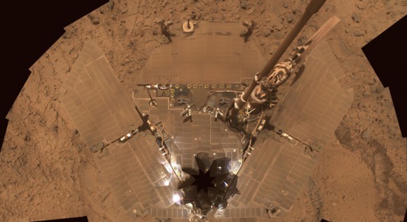 The Spirit rover's solar panels were covered with dust until a gust of wind blew it off. Credit: NASA.