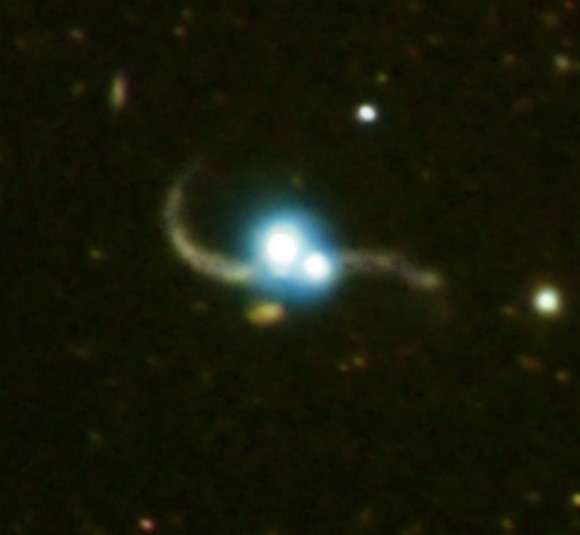 SDSS J1254+0846 x-ray (blue), optical (yellow)(Credits: X-ray: NASA/CXC/SAO/Green et al Optical: Carnegie Obs/Magellan/Baade Telescope/Mulchaey et al)