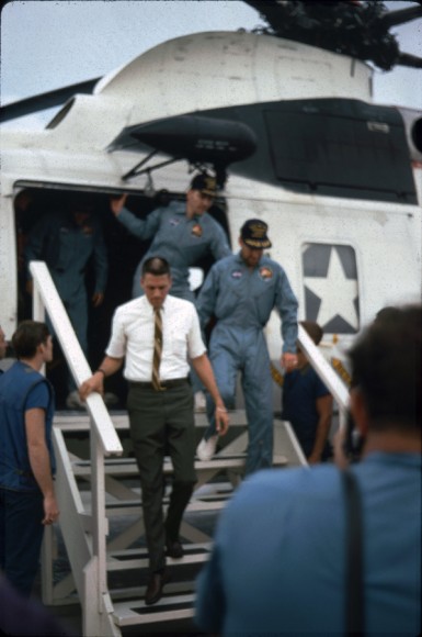 Lovell and Swigert emerge from rescue helicopter, April 17, 1970. Image courtesy Robert Gillette.