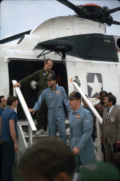 Swigert and Haise emerge from rescue helicopter,steppind on deck of the Iwo Jima. Image courtesy Robert Gillette.