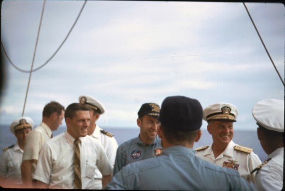 Jim Lovell talks with USS Iwo Jima Commanders after the Apollo 13 capsule was recovered. Image courtesy of Robert Gillette.