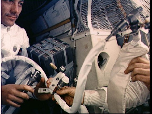Jack Swigert works on the CO2 canister during the Apollo 13 mission. Credit: NASA