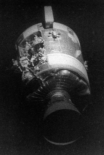 Photograph of exterior of the Apollo 13 spacecraft showing the damage caused by the oxygen tank explosion. If something like this happened to a Mars expedition - perhaps as a result of a micrometeorite - there would be many communication difficulties involved in trying to sort it out with communication delays with Earth of possibly over 40 minutes.