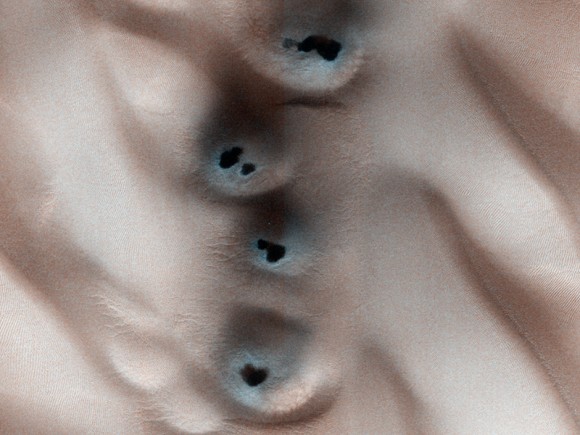 A new image from the HiRISE camera on MRO showing mounds of south polar layered deposits. Credit: NASA/JPL/University of Arizona