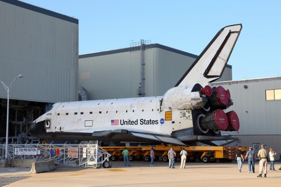 Atlantis just leaving the Orbiter Processing Facility. Image credit: Alan Walters (awaltersphoto.com) for Universe Today