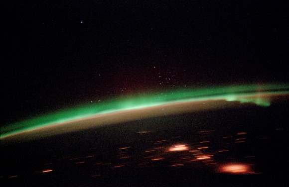 City lights and the Aurora Borealis City lights and the Aurora Borealis