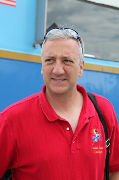 Astronaut Mike Massimino disembarks from the train carrying the SRB segments. Credit: Alan Walters (awaltersphoto.com) for Universe Today.