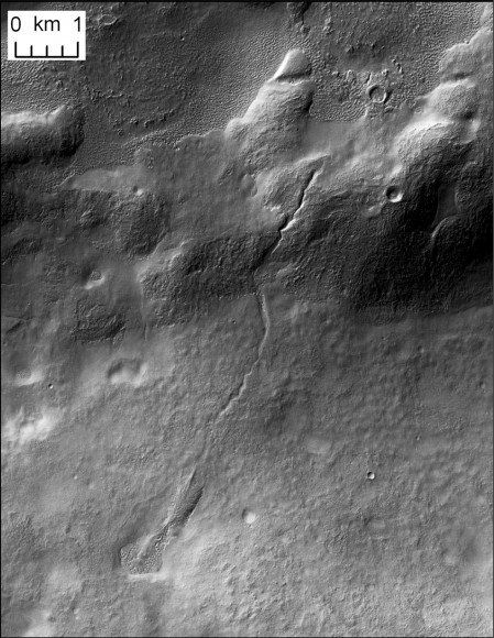 This image shows a river that sprang from a past glacier from an unnamed crater in Mars’ middle latitudes. Credit: NASA/JPL/MSSS