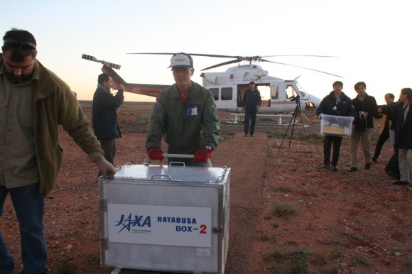 JAXA's Hayabusa space capsule is transported inside a box to a clean room inside the Instrumentation Building at the Woomera Test Range, South Australia. Credit: Australian Science Media Centre.