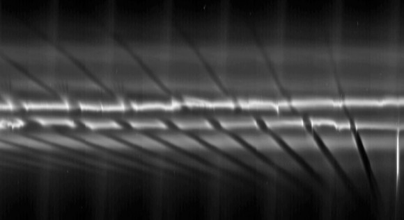 This mosaic of images from NASA's Cassini spacecraft shows three fan-like structures in Saturn's tenuous F ring. Such "fans" suggest the existence of additional objects in the F ring. Image credit: NASA/JPL/SSI