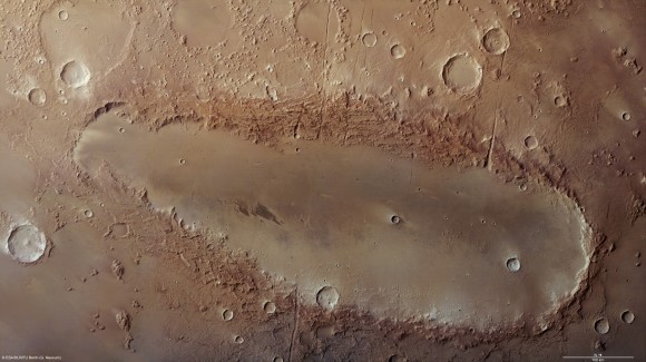 Orcus Patera is an enigmatic elliptical depression. Credits: ESA/DLR/FU Berlin (G. Neukum)