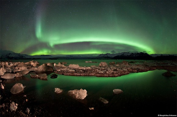 Aurora Borealis at Jökulsárlón (Glacier Lagoon) south coast Iceland. Credit: Skarphéðinn Þráinsson. Used by permission
